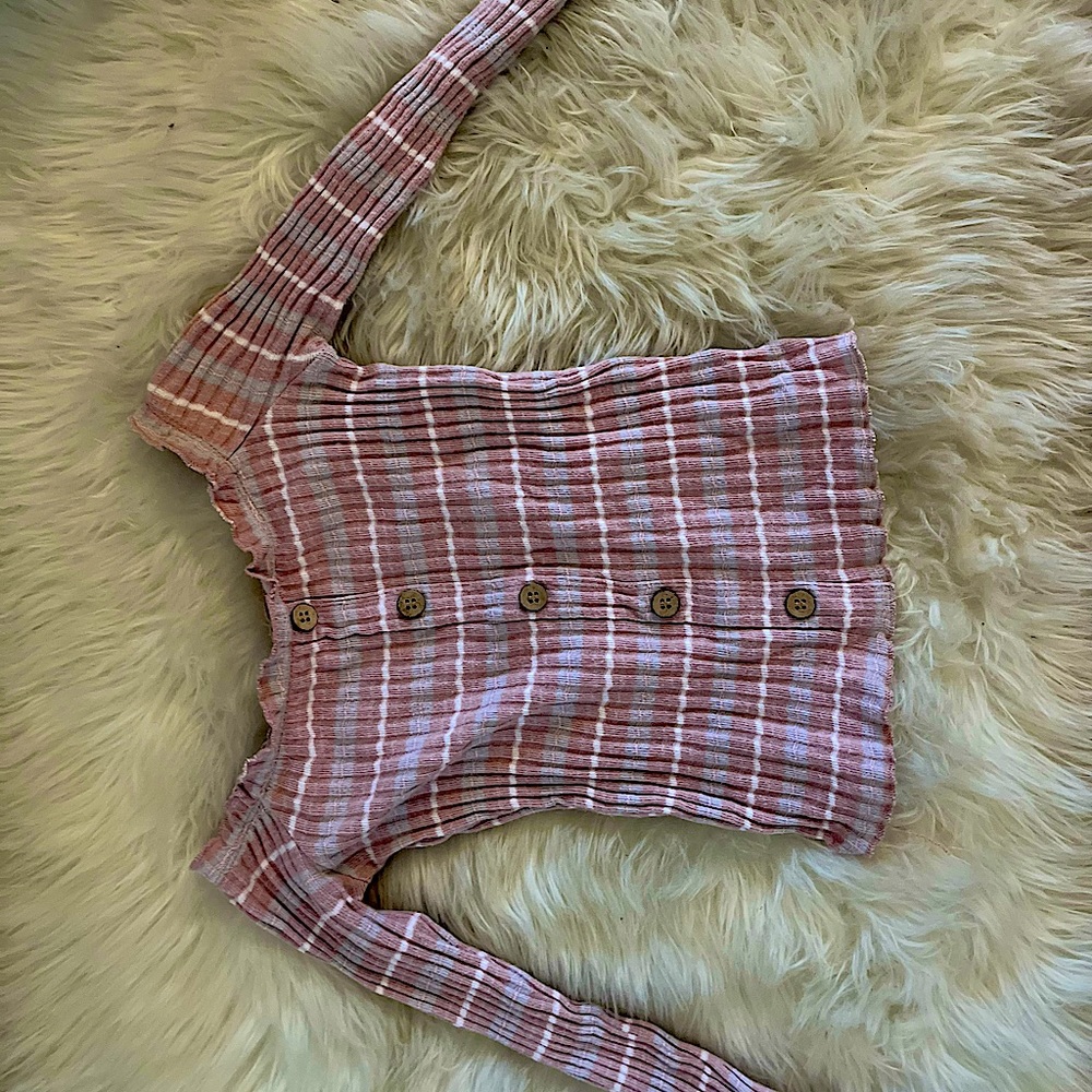 Small pink crop top.